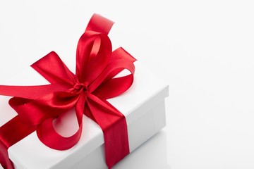 Gift decorated with a tape and a bow