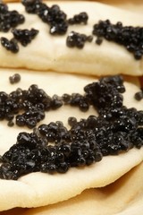 Caviar black with pancakes, a pancake week
