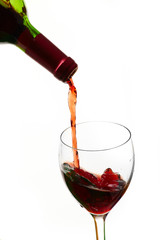 Fototapeta na wymiar Red wine filling a glass, drink