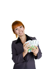 Excited businesswoman holding money