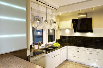 Interior details of modern fitted kitchen in home.