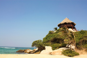 Hut with hammocks on a Caribbean beach. Tayrona National Park. - 20426947