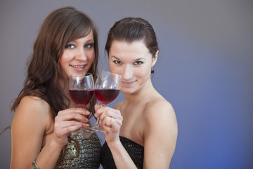 girls toasting wine