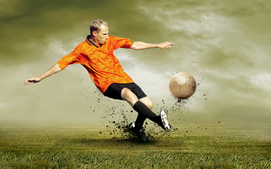 Naklejka premium Shoot of football player on the outdoors field
