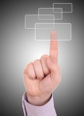 The hand pressing one of the buttons on grey background