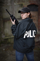 Female police officer with rifle