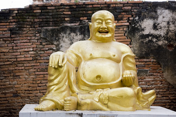Stone statue of a Buddha in Ayutthaya, Thailand.