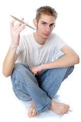 Young drummer spinning his stick
