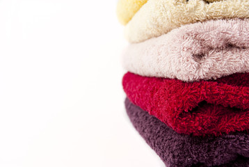 Pink, red, yellow and purple towels