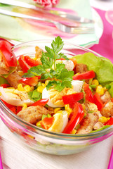 fresh salad with breaded meat and vegetables