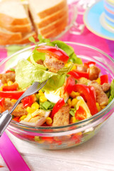 fresh salad with breaded meat and vegetables