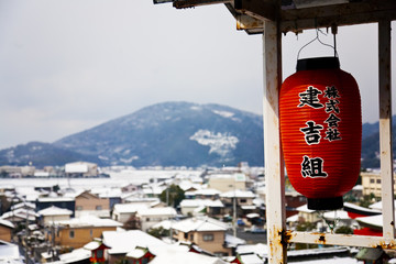 Japanese lantern and snow city background.Kumamoto,Japan