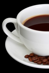 Coffee cup with coffee beans
