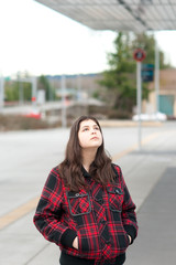 Fototapeta premium Young girl in transit center