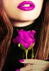 Pretty woman with a rose