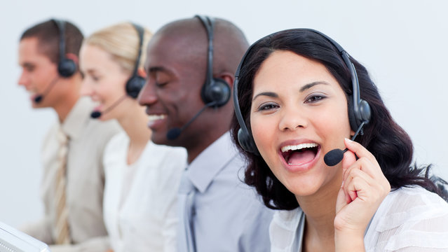 Happy business team in a call center