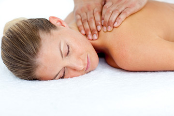 Fototapeta na wymiar Relaxed woman receiving a back massage