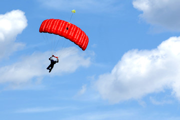 Extreme sports. parachuting under a blue sky