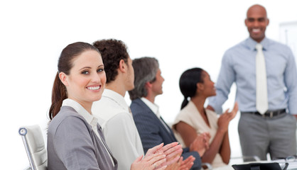 Fototapeta na wymiar Positive business people clapping a good presentation