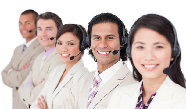 Young customer service representatives standing in a row