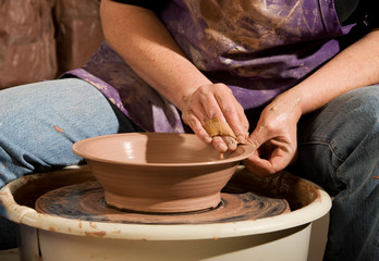 Fototapeta na wymiar Potter Shaping Clay