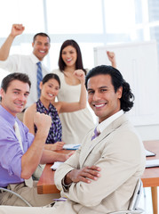 International business team celebrating a success