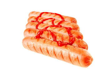red sausages with ketchup