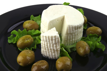 soft feta cheese with gold olives