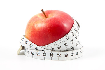 Red apple and measuring tape