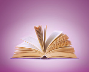 Open book on an abstract background