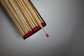 Box of Matches lit by spotlight