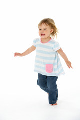 Young Girl Running In White Studio