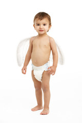 Studio Portrait Of Toddler Wearing Nappy And Angel Wings