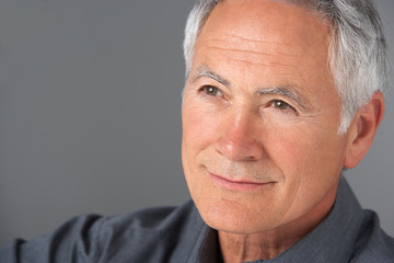 Studio Portrait Of Senior Man
