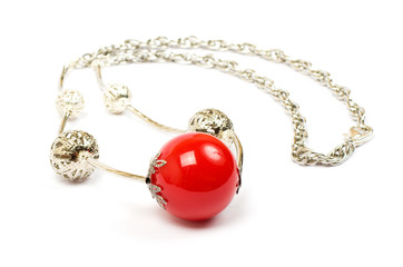 Red gem necklace on white