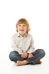 Young Boy Sitting In Studio