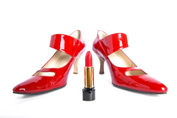 Shoes on a high heel and lipstick