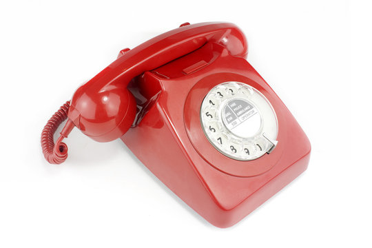 old fashioned bright red telephone handset