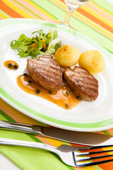 Grilled steaks and vegetables