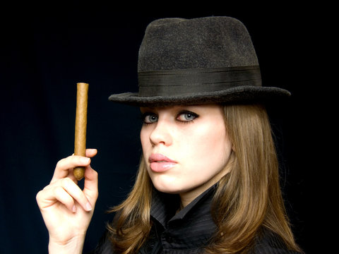 woman in black with a cigarette in a hand