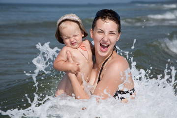Mother and child in the sea