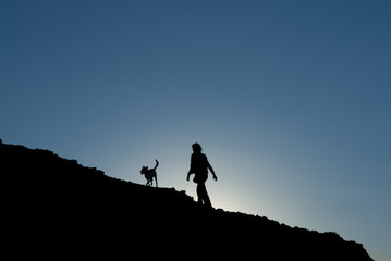 Fototapeta premium Silhouette of one woman on a mountian