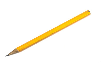 yellow pencil on white background
