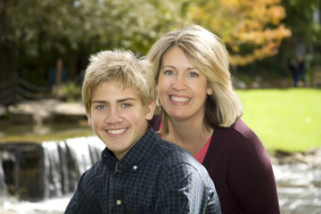 Mom and Son by Waterfall