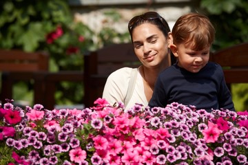 Child and mother outdoor in spring