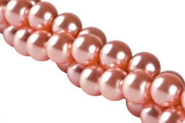 The overwound thread of pink pearls