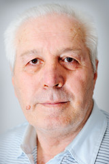 A portrait of a smiling old man