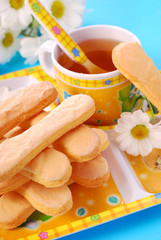 sponge fingers and tea for child
