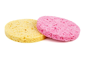 Pink and yellow cosmetic sponges