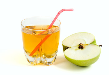 half a green apple and a glass of apple juice